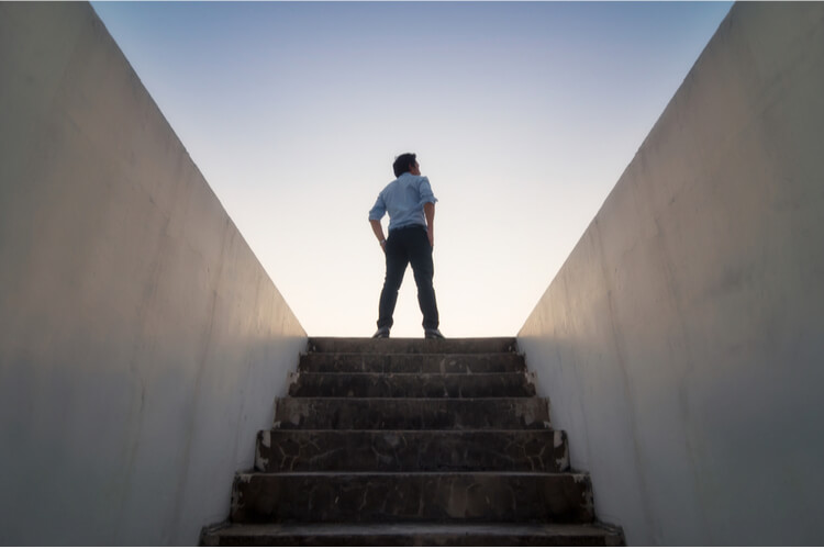 man on stairs ambition